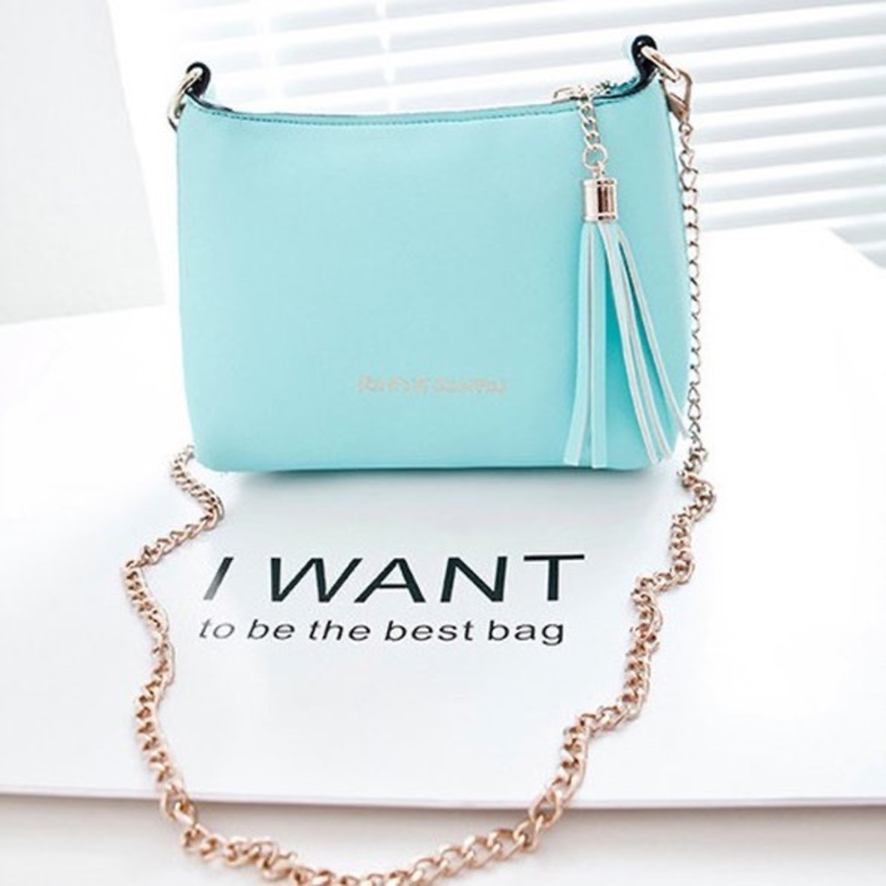 Carter’s Rimfne Ginjpin crossbody bag